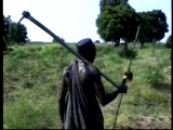 Salu Kadelya pointing to his cassava field